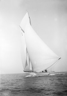 The 19-metre class 'Corona' running downwind, 1911. Creator: Kirk & Sons of Cowes.