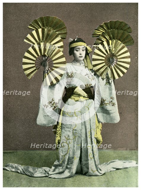 Girl performing a fan dance, Japan, 1904. Artist: Unknown