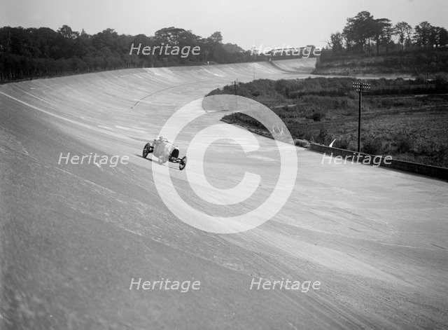 HE 14/40 driven by RJ Sully, Brooklands. Artist: Bill Brunell.