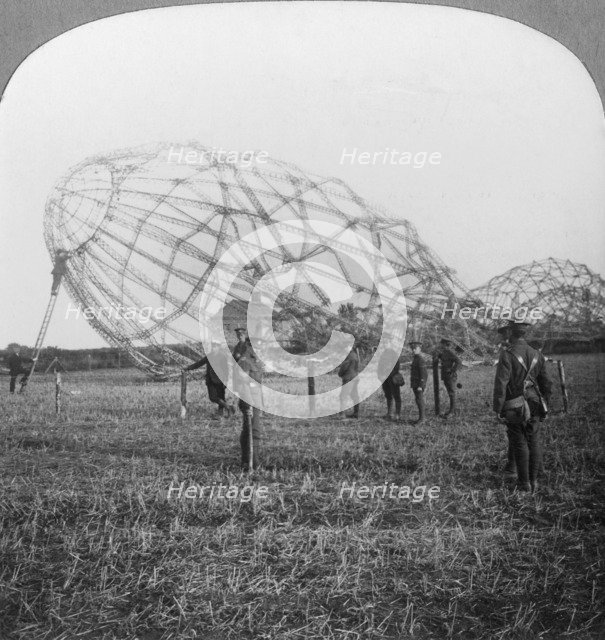 Zeppelin shot down near Colchester, Essex, World War I, 1916. Artist: Realistic Travels Publishers