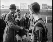 Prince Albert, Duke of York, Shaking Hands With Football Team at West Ham Before a Match, 1922.  Creator: British Pathe Ltd.