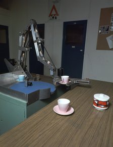 Table-clearing robot. Artist: Meredith Thring