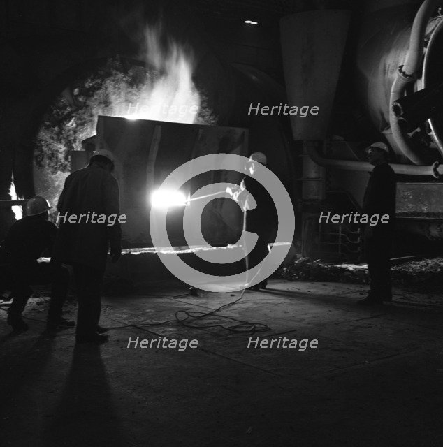 Testing temperature of molten steel, Park Gate Iron & Steel Co, Rotherham, South Yorkshire, 1964. Artist: Michael Walters