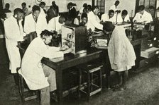 'Scenes in a Native College - Students in the physics laboratory', c1948. Creator: Unknown.