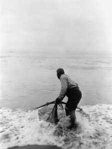 The smelt fisher-Trinidad Yurok, c1923. Creator: Edward Sheriff Curtis.