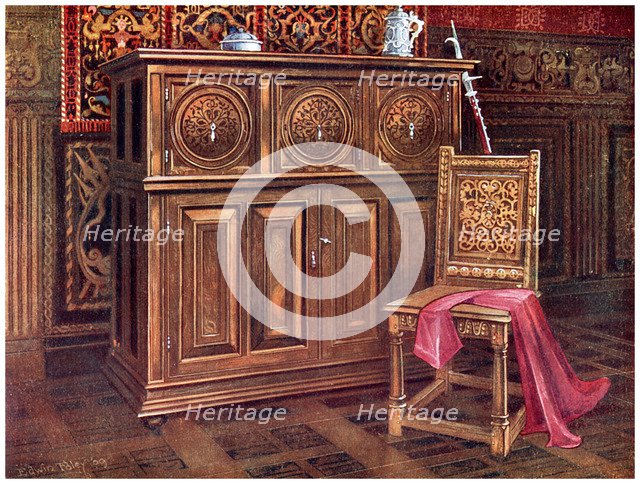 Oak cabinet and walnut chair, 1910.Artist: Edwin Foley