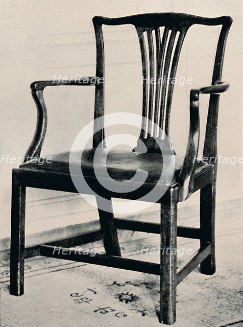 'Simple Chippendale Mahogany Arm-Chair with Rail Back and Movable Seat', mid 18th century, (1927) . Artists: Edward F Strange, Thomas Chippendale.