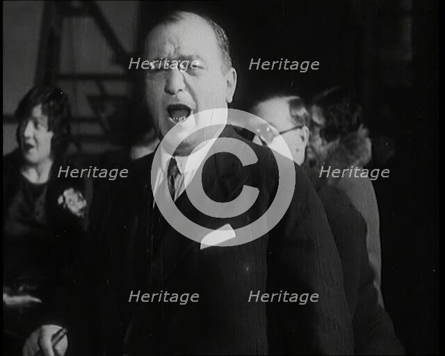 Female Civilian Singing Scales Badly Whilst Other Female Civilian is Playing the Piano in..., 1920s. Creator: British Pathe Ltd.