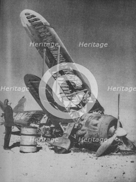 'Crashed in the Regia Aeronautica's Graveyard', 1941.  Artist: Unknown.