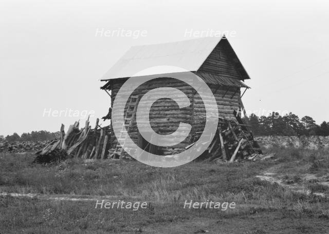 Tobacco barn without front shelter, Person County, North Carolina, 1939. Creator: Dorothea Lange.