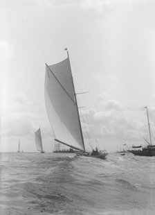 The 19-metre 'Octavia' sailing on a broad reach, 1911. Creator: Kirk & Sons of Cowes.