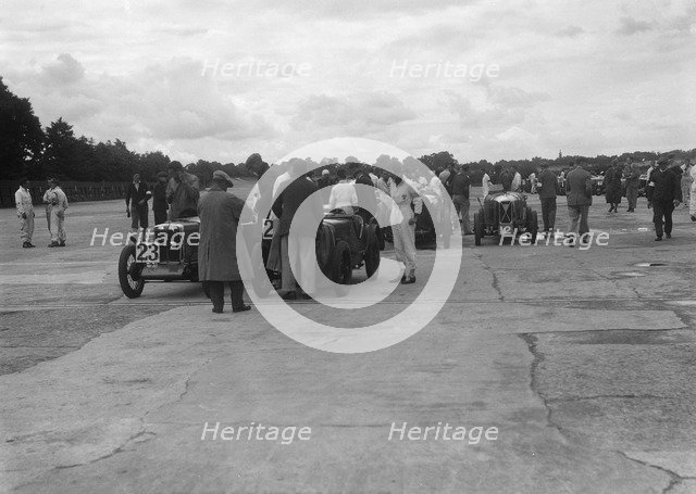 MG and Austin 7 at the LCC Relay GP, Brooklands, 25 July 1931. Artist: Bill Brunell.