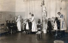 A school-children's dental clinic in Berlin: some children being treated..., c1900. Creator: Unknown.