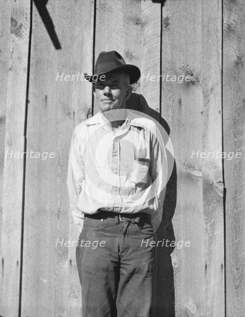 One of the thirty-six members of the Ola self-help sawmill co-op, Gem County, Idaho, 1939. Creator: Dorothea Lange.