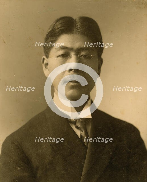 Tokutaro Sakai, head-and-shoulders portrait, facing front, c1904. Creator: J E Purdy.
