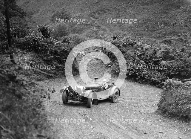 1935 Jaguar SS 90 2-seater taking part in a motoring trial, late 1930s. Artist: Bill Brunell.