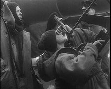 British Sailor Firing an Anti Aircraft Gun in Norwegian Coastal Waters, 1940. Creator: British Pathe Ltd.