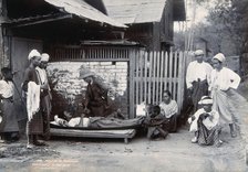 An outdoor examination of a plague patient in Mandalay, 1906. Creator: Unknown.