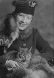 Campbell, Natalie, Miss, with Buzzer the cat, portrait photograph, 1914 Dec. 24. Creator: Arnold Genthe.