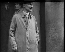 Clement Attlee Standing Outside a Building, 1930s. Creator: British Pathe Ltd.