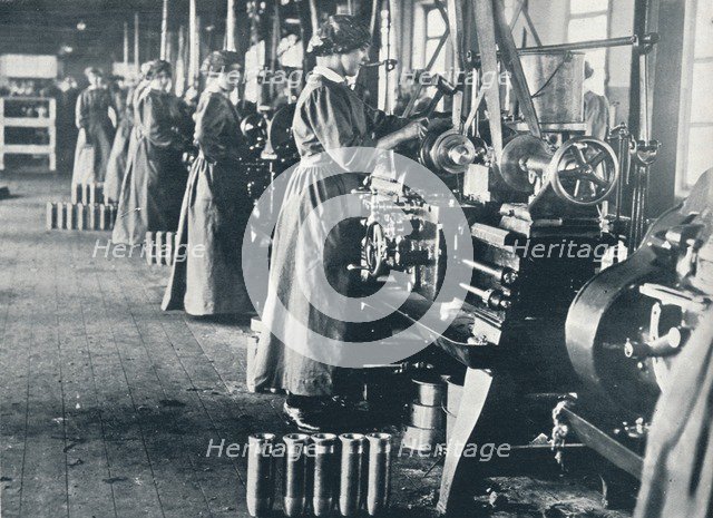 Girl munition workers at their lathes in a Scottish mill, c1914. Artist: Unknown