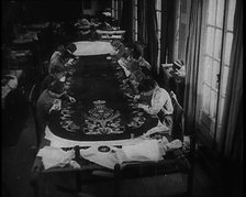 Seamstresses Sewing the Embroidery on the Coronation Mantle of King George VI, 1937. Creator: British Pathe Ltd.