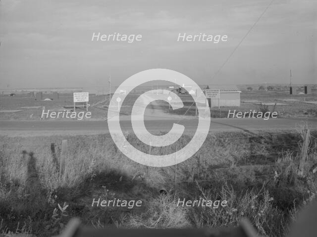 Entrance to Nyssa Farm family labor camp, FSA mobile unit...1, Near Nyssa, Oregon, 1939. Creator: Dorothea Lange.
