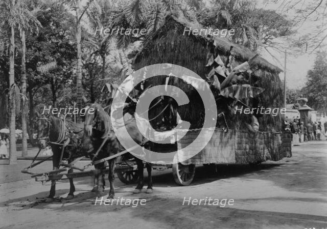 An old Hawaiian dwelling - float in Floral Parade, Honolulu, 1910. Creator: Bain News Service.