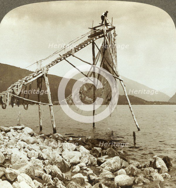 'Fisherman arranging salmon nets at Balestrand on Sognefjord - Balholm in distance, Norway', c1905. Creator: Unknown.