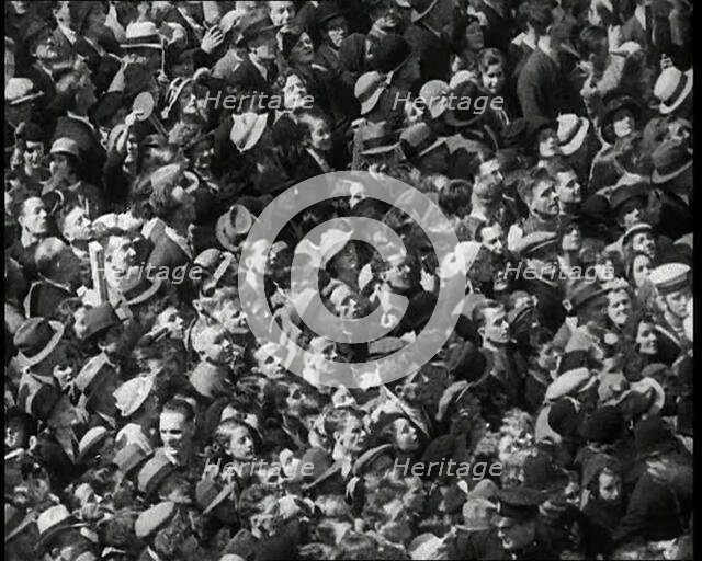 Crowd Watching the Silver Jubilee Parade of George V, His Majesty The King, 1936. Creator: British Pathe Ltd.