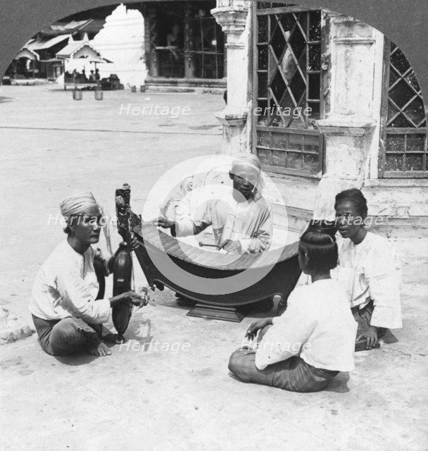 Musicians, Shwedagon Pagoda, Rangoon, Burma, 1908. Artist: Stereo Travel Co