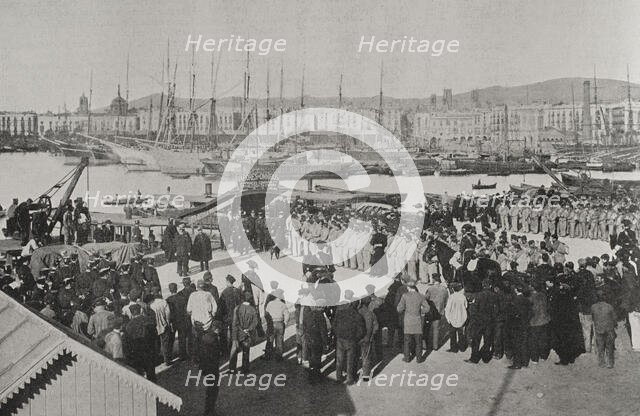 Troops embarkation for the island of Cuba from the port of Barcelona, Spain, 25 February 1898.  Creator: Unknown.