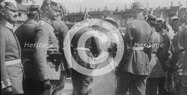 Kaiserin gives roses to departing officers, between 1914 and c1915. Creator: Bain News Service.