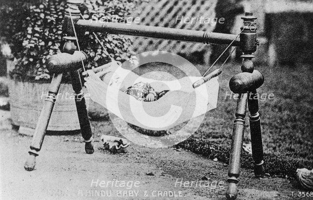 Hindu baby and cradle, India, 20th century. Artist: Unknown