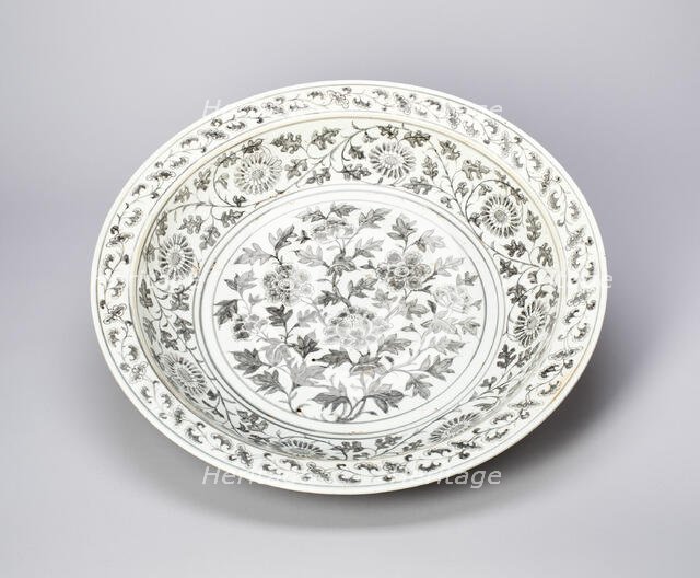 Shallow Dish with Peony Scrolls, Chrysanthemum Spray, and Key-Fret..., Ming dynasty, late 14th cent. Creator: Unknown.