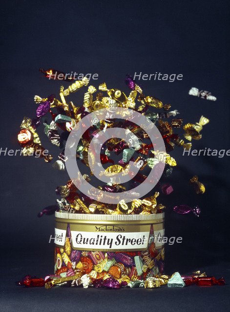Mackintosh's Quality Street, exploding tin advertisment shot, 1972. Artist: Michael Walters