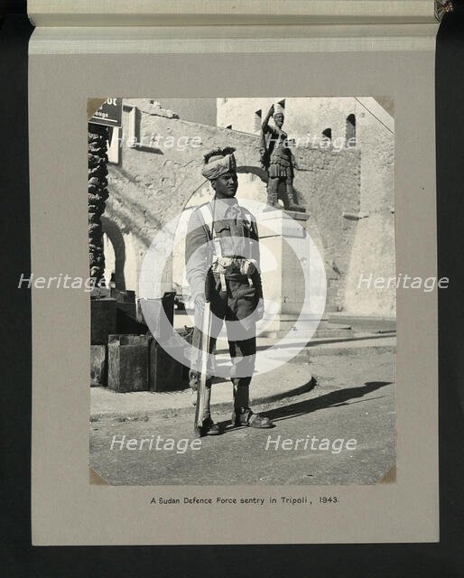 A Sudan Defence Force sentry in Tripoli, 1943. Creators: Colonial Office, Unknown.