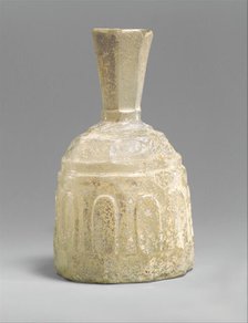 Glass Bottle with Faceted Decoration, Iran, 9th-10th century. Creator: Unknown.