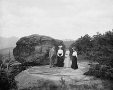 Mr. H.E. Eder and family at Bowlder [i.e. Boulder] Rock, between 1900 and 1905. Creator: William H. Jackson.