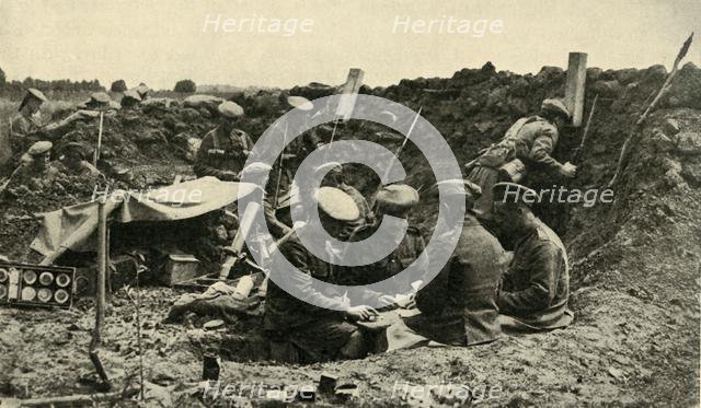 Soldiers playing cards in the trenches, First World War, c1916, (c1920).  Creator: Unknown.