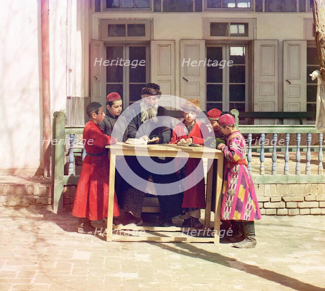 Group of Jewish children with a teacher, Samarkand, between 1905 and 1915. Creator: Sergey Mikhaylovich Prokudin-Gorsky.