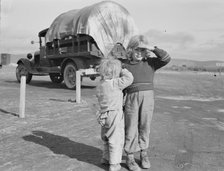 Migrant children, FSA mobile camp, Merrill, Klamath County, Oregon, 1939. Creator: Dorothea Lange.