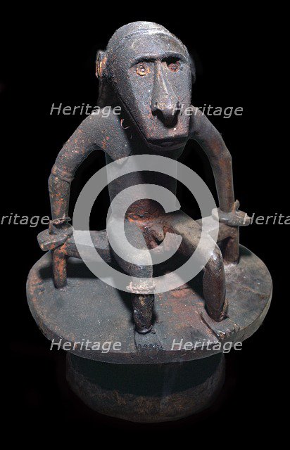 Wooden figure of a sea spirit, with head in the form of a shark, from the Solomon Islands. Artist: Unknown