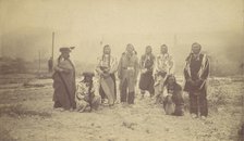 Group of Native American Men, Telegraph Poles in Background, 1880s-90s. Creator: Unknown.