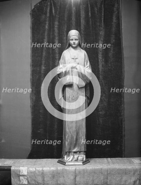 Statue of St. Theresa by Mario Korbel, between 1914 and 1928. Creators: Arnold Genthe, Mario Korbel.