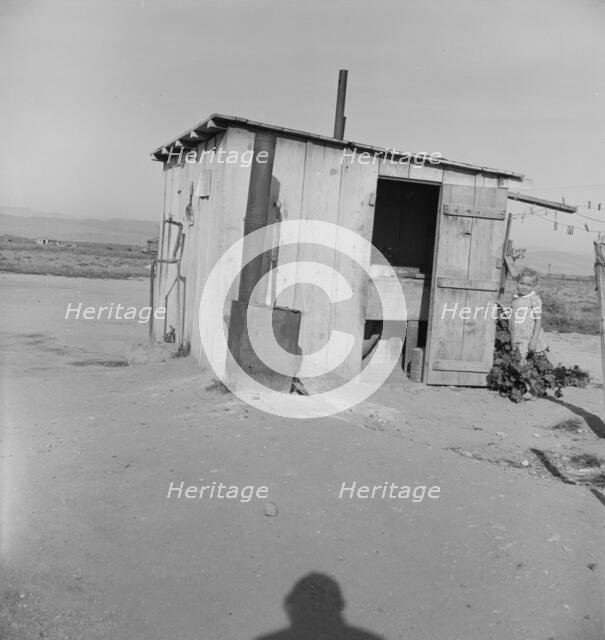 Laundry facilities for ten cabins at Arkansawyers auto camp, Salinas Valley, CA , 1939. Creator: Dorothea Lange.