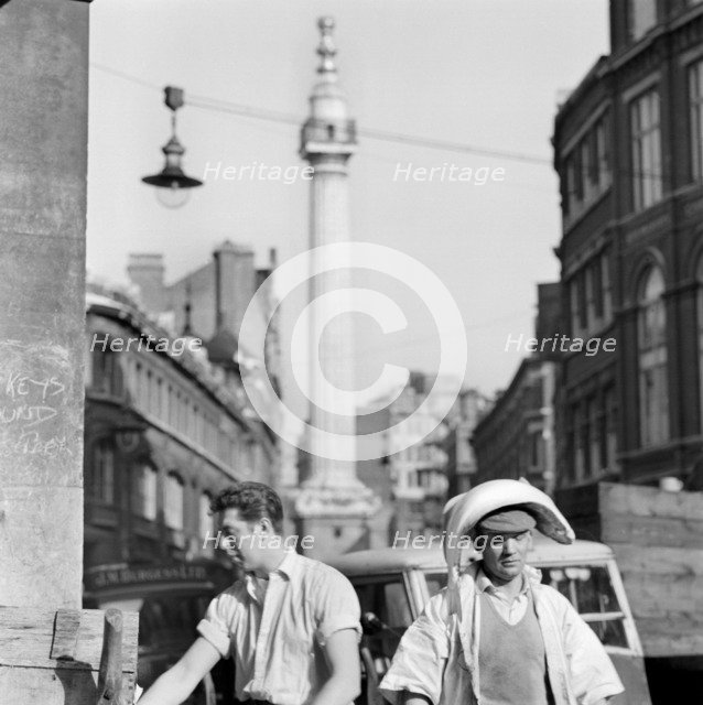 An informal portrait of two porters outside Billingsgate Fish Market, London, c1946-c1959. Artist: John Gay
