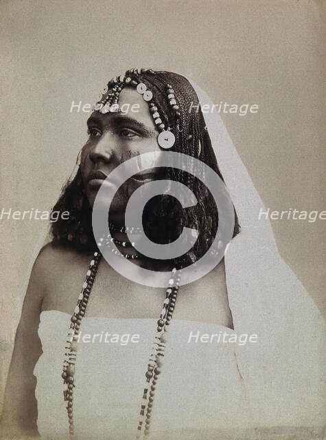 A North African woman with scarification on her cheeks, c1900. Creator: Gabriel Lekegian.