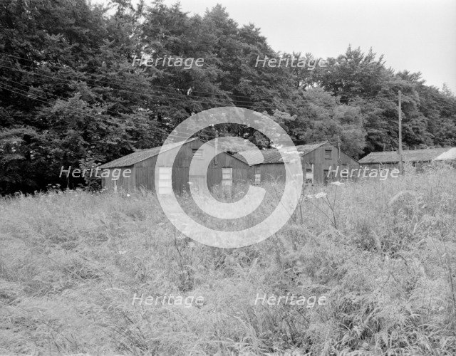 Accommodation huts in Greenaway Lane, Ullenwood, Gloucestershire, 1999. Artist: EH/RCHME staff photographer