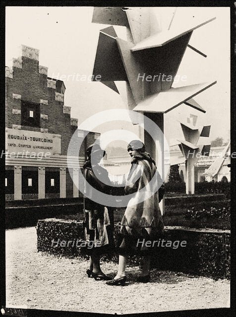 Models wearing dresses by Sonia Delaunay in front of the Arbre Cubiste (Cubist Tree) by the..., 1925 Creator: Mallet-Stevens, Robert (1886-1945).